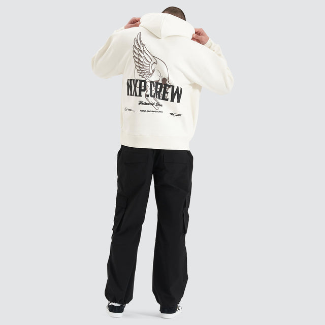 Model Wears Corbusian Heavy Box Fit Hoodie Natural White Hoodies in White - Image 3
