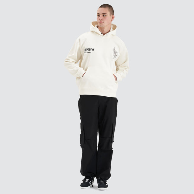 Model Wears Corbusian Heavy Box Fit Hoodie Natural White Hoodies in White - Image 2
