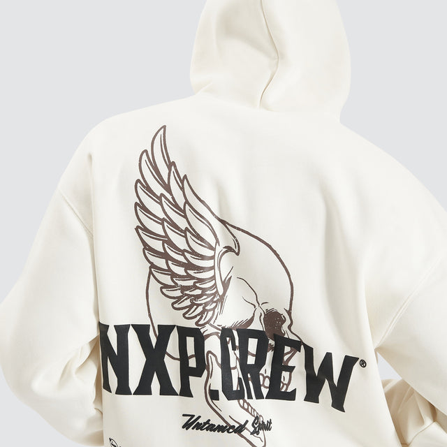 Model Wears Corbusian Heavy Box Fit Hoodie Natural White Hoodies in White - Image 4