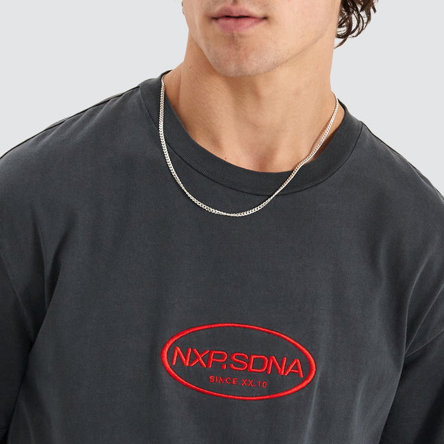 Model Wears Cycle Relaxed Tee Pigment Anthracite Black T-Shirts in Black - Image 2