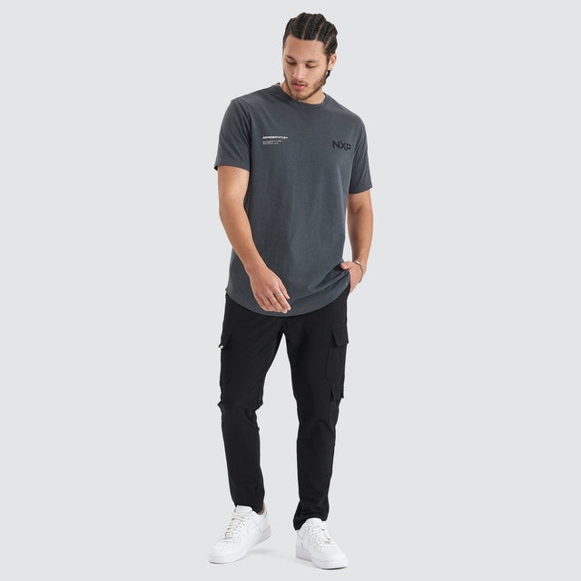 Model Wears Delta Time Dual Curved Tee Pigment Asphalt T-Shirts in Grey - Image 4