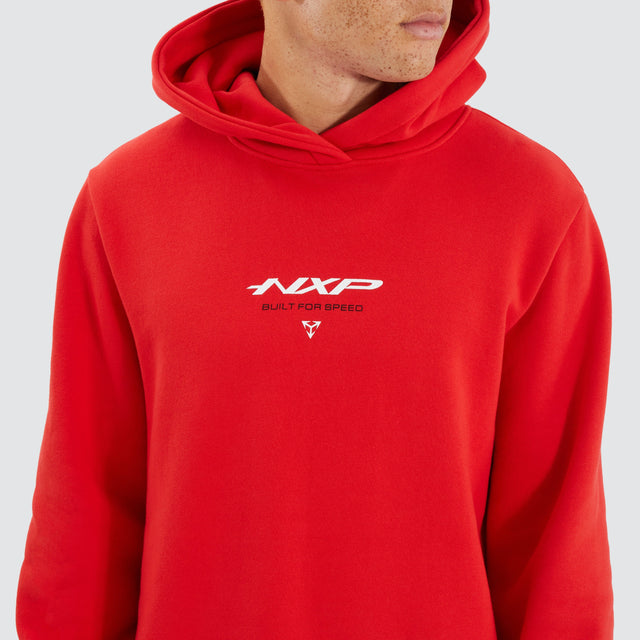 Model Wears Digit Dual Curved Hoodie Poppy Red Hoodies in Red - Image 3