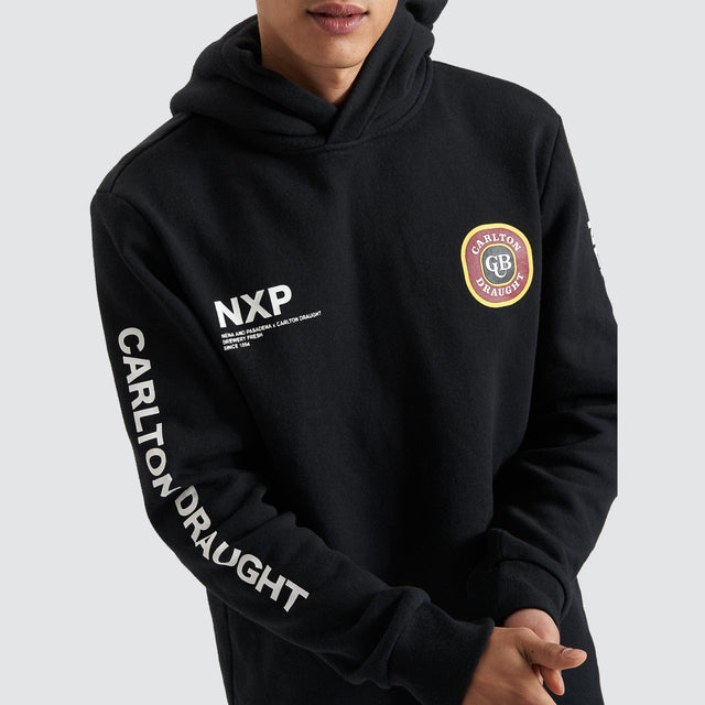 Model Wears Drummond Dual Curved Hoodie Jet Black Hoodies in Black - Image 9