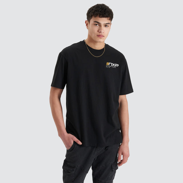 Model Wears Dynamic Heavy Box Fit Tee Jet Black T-Shirts in Black - Image 3