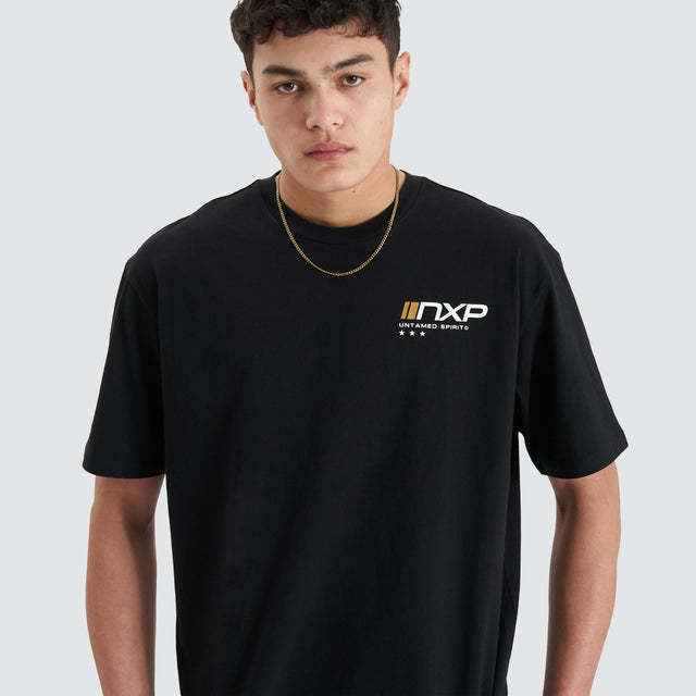 Model Wears Dynamic Heavy Box Fit Tee Jet Black T-Shirts in Black - Image 4