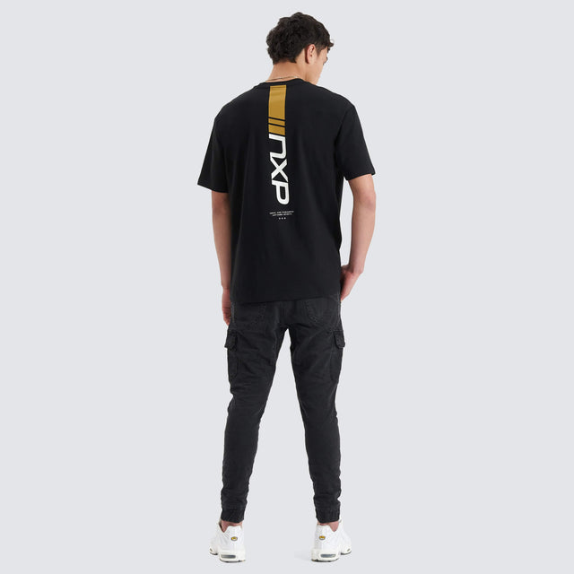 Model Wears Dynamic Heavy Box Fit Tee Jet Black T-Shirts in Black - Image 6