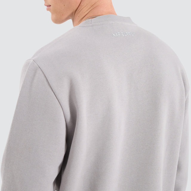Model Wears Fernie Dual Curved Sweater Alloy Jumpers in Grey - Image 4