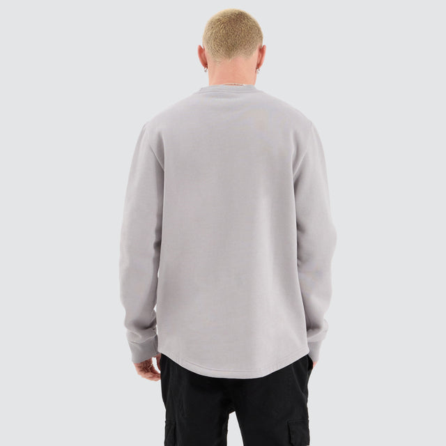 Model Wears Fernie Dual Curved Sweater Alloy Jumpers in Grey - Image 2