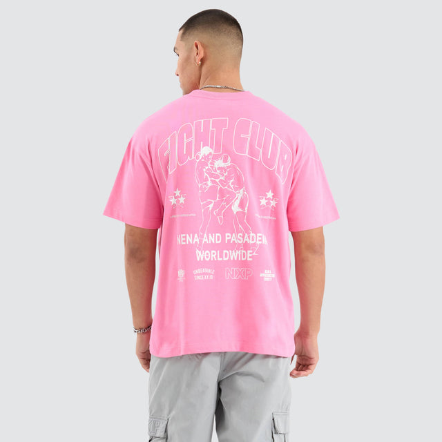Model Wears Fight Club Raptor Tee Pink T-Shirts in Pink - Image 1