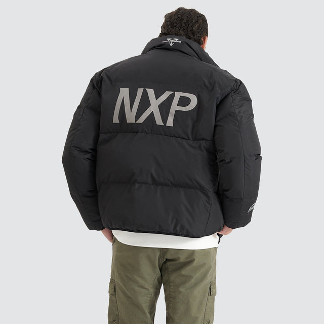 Model Wears Forfeit Puffer Jacket Jet Black Jackets in Black - Image 2
