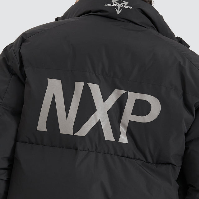 Model Wears Forfeit Puffer Jacket Jet Black Jackets in Black - Image 6