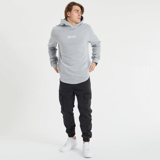 Model Wears Future Hooded Dual Curved Hoodie Pigment Alloy Hoodies in Grey - Image 3