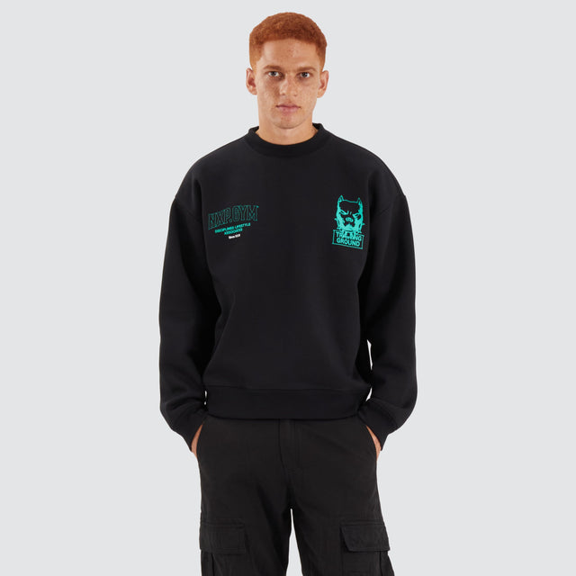 Model Wears Ground Box Fit Sweater Jet Black Jumpers in Black - Image 7