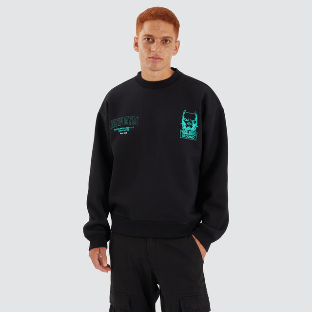 Model Wears Ground Box Fit Sweater Jet Black Jumpers in Black - Image 2