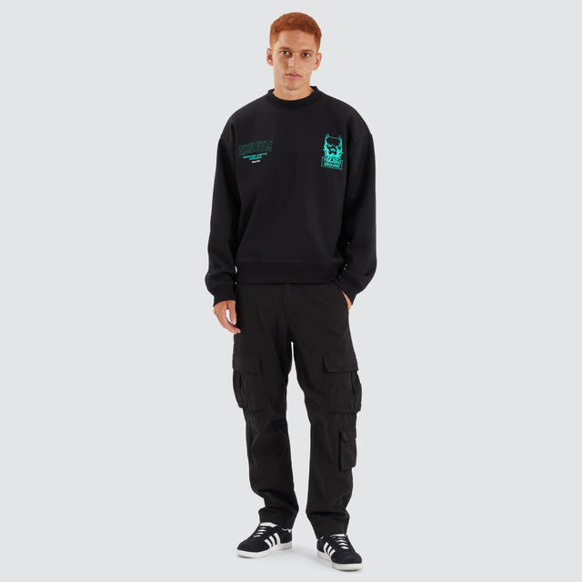 Model Wears Ground Box Fit Sweater Jet Black Jumpers in Black - Image 3