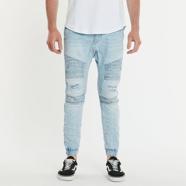 Model Wears Hellcat Pant Astoria Blue Pants in Blue - Image 1