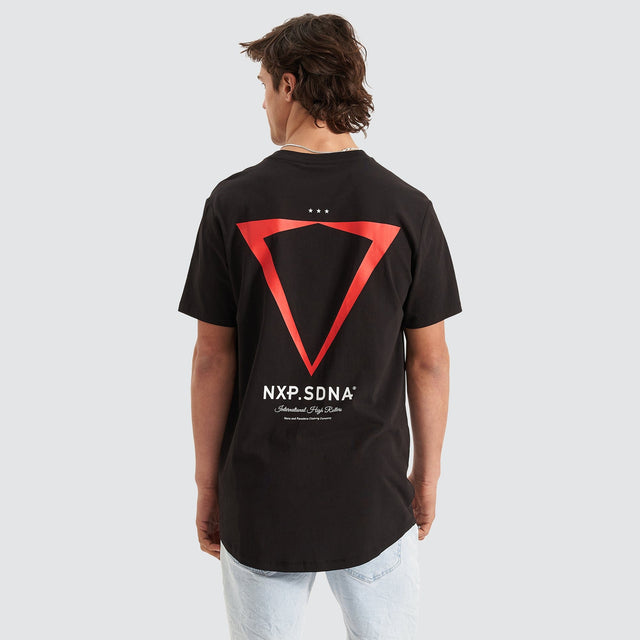 Model Wears International Cape Back Tee Jet Black T-Shirts in Black - Image 1