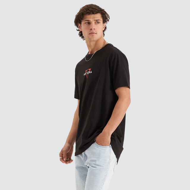 Model Wears International Cape Back Tee Jet Black T-Shirts in Black - Image 5