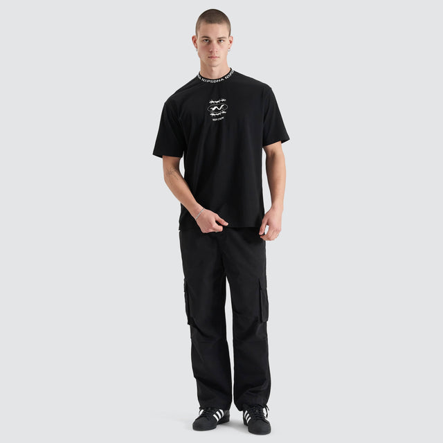 Model Wears Ionic Heavy Box Fit Tee Jet Black T-Shirts in Black - Image 5