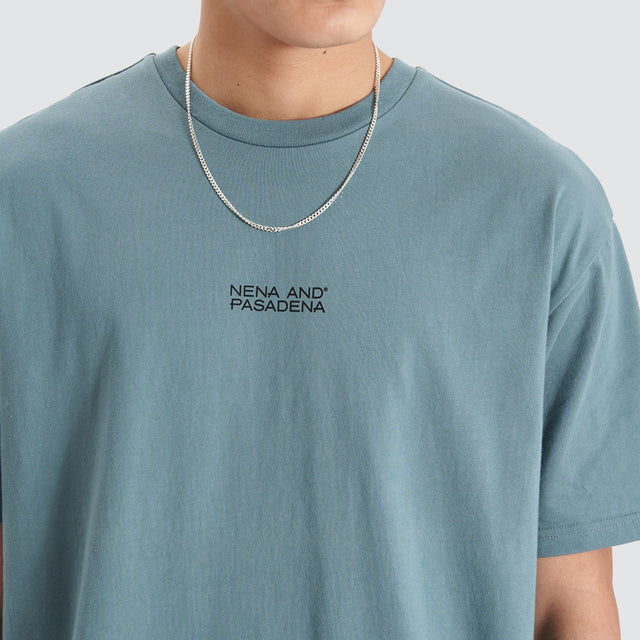 Model Wears Keystone Heavy Box Fit Tee Goblin Blue T-Shirts in Blue - Image 5