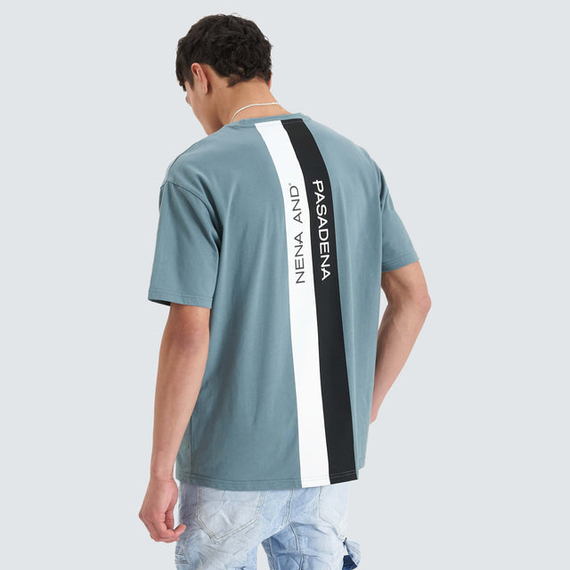 Model Wears Keystone Heavy Box Fit Tee Goblin Blue T-Shirts in Blue - Image 1