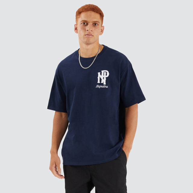 Model Wears Legacy Box Fit Tee Navy Blue T-Shirts in Blue - Image 2