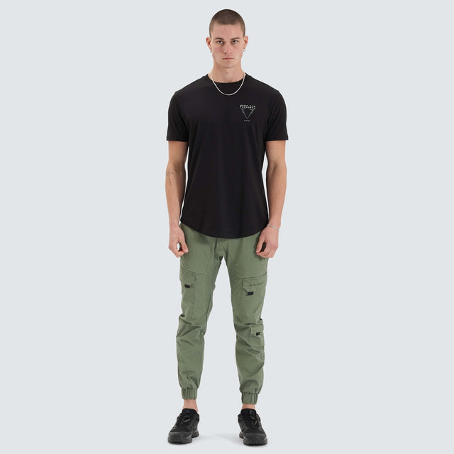 Model Wears Level Dual Curved Tee Jet Black T-Shirts in Black - Image 4