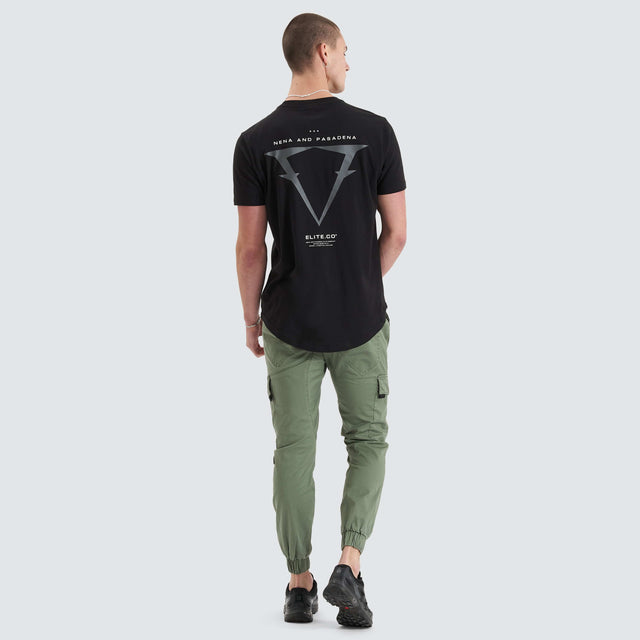 Model Wears Level Dual Curved Tee Jet Black T-Shirts in Black - Image 5