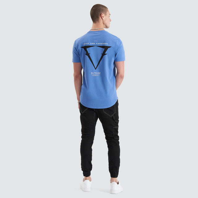 Model Wears Level Dual Curved Tee Pigment Dutch Blue T-Shirts in Blue - Image 3