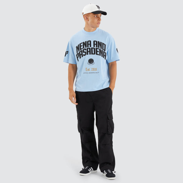 Model Wears Members Loopback Street Tee Placid Blue T-Shirts in Blue - Image 4