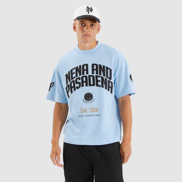 Model Wears Members Loopback Street Tee Placid Blue T-Shirts in Blue - Image 5