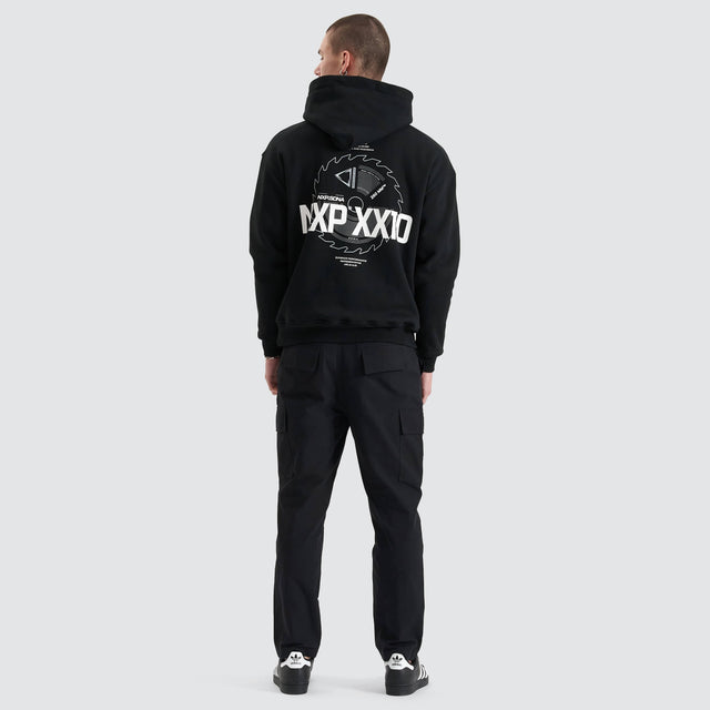 Model Wears Mortar Heavy Relaxed Hoodie Jet Black Jumpers in Black - Image 7