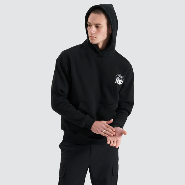 Model Wears Mortar Heavy Relaxed Hoodie Jet Black Jumpers in Black - Image 3