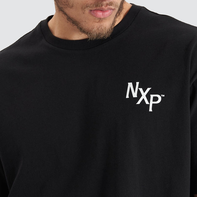 Model Wears Orbit Heavy Box Fit Tee Jet Black T-Shirts in Black - Image 3