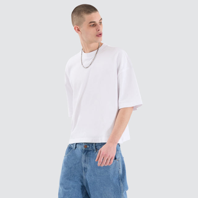 Model Wears Osaka Cube Tee Optical White T-Shirts in White - Image 1