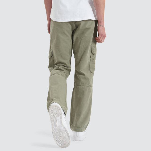 Model Wears Overland Cargo Pant Sage Pants in Green - Image 2