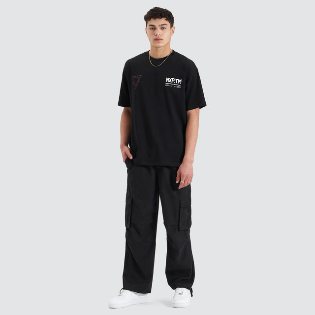 Model Wears Pantheon Heavy Box Fit Tee Jet Black T-Shirts in Black - Image 4