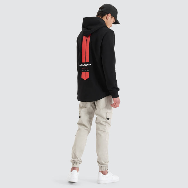 Model Wears Parallax Hooded Dual Curved Sweater Jet Black Hoodies in Black - Image 2