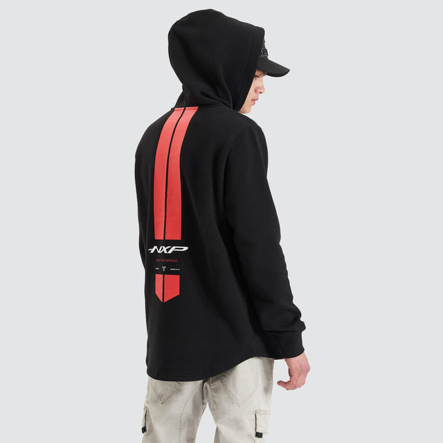 Model Wears Parallax Hooded Dual Curved Sweater Jet Black Hoodies in Black - Image 1