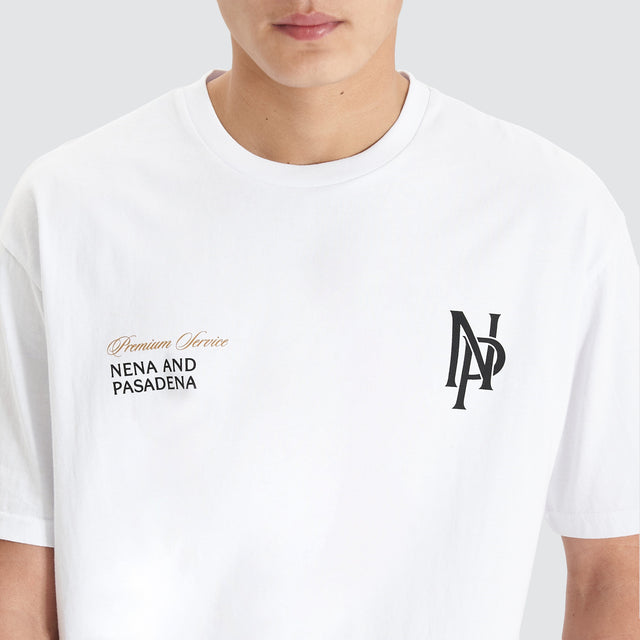 Model Wears Petronas Heavy Box Fit Tee Optical White T-Shirts in White - Image 4
