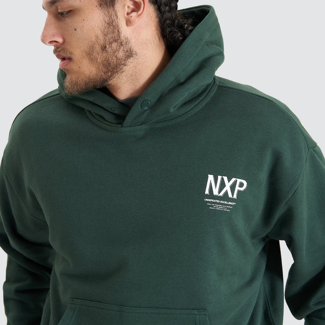 Model Wears Platinum Heavy Box Fit Hoodie Pine Grove Hoodies in Green - Image 2