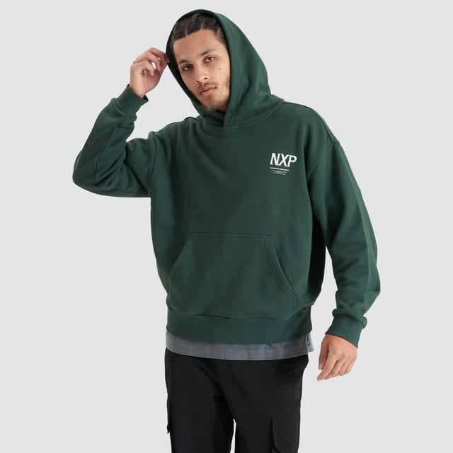 Model Wears Platinum Heavy Box Fit Hoodie Pine Grove Hoodies in Green - Image 5