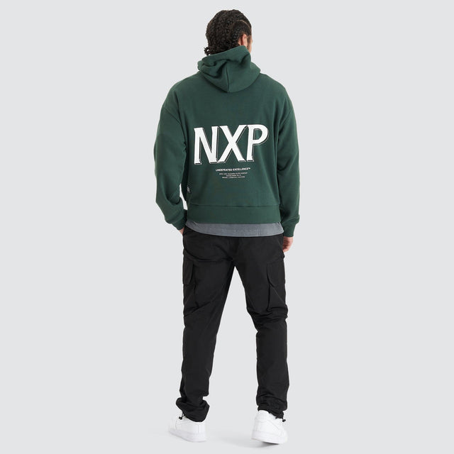 Model Wears Platinum Heavy Box Fit Hoodie Pine Grove Hoodies in Green - Image 6