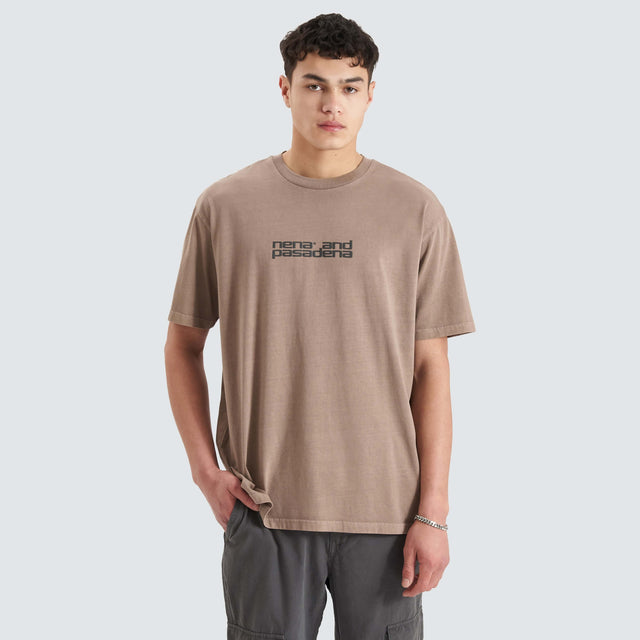 Model Wears Post-Industrial Heavy Box Fit Tee Pigment Bark T-Shirts in Brown - Image 6