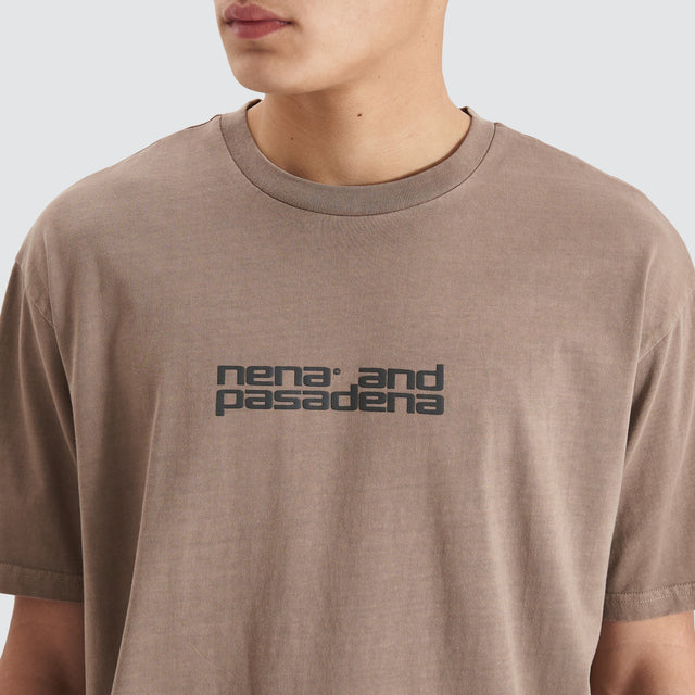 Model Wears Post-Industrial Heavy Box Fit Tee Pigment Bark T-Shirts in Brown - Image 2