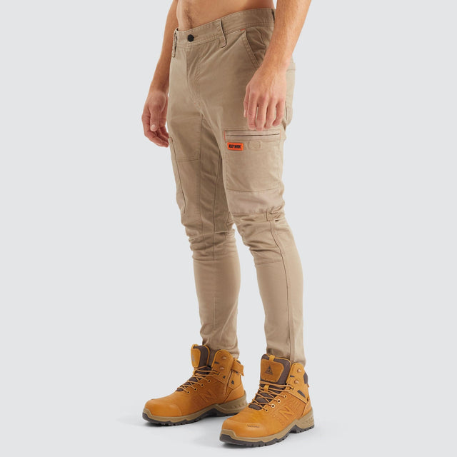 Model Wears Precision Slim Fit Pant Sand Pants in Beige - Image 10