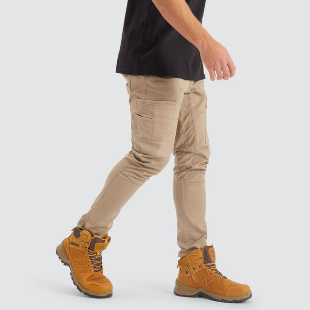 Model Wears Precision Slim Fit Pant Sand Pants in Beige - Image 6