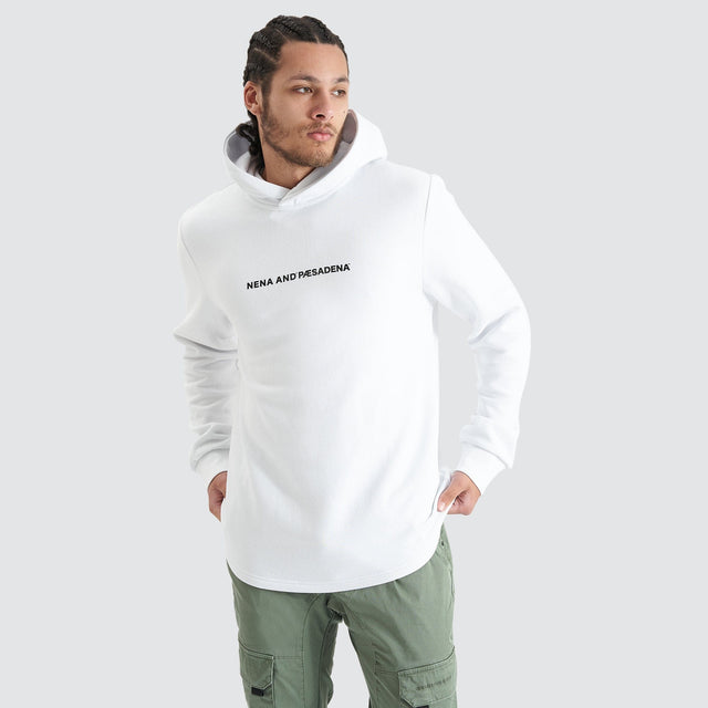 Model Wears Primal Dual Curved Hooded Sweater Optical White Hoodies in White - Image 1
