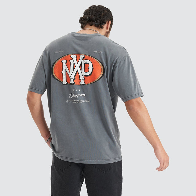 Model Wears Profile Heavy Box Fit Tee Pigment Castlerock T-Shirts in Grey - Image 1