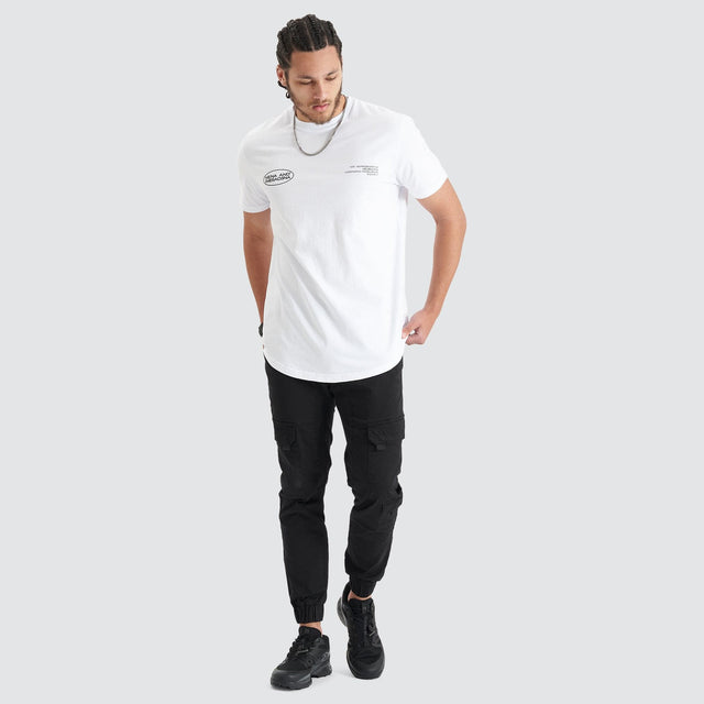 Model Wears Project Dual Curved Tee Optical White T-Shirts in White - Image 4